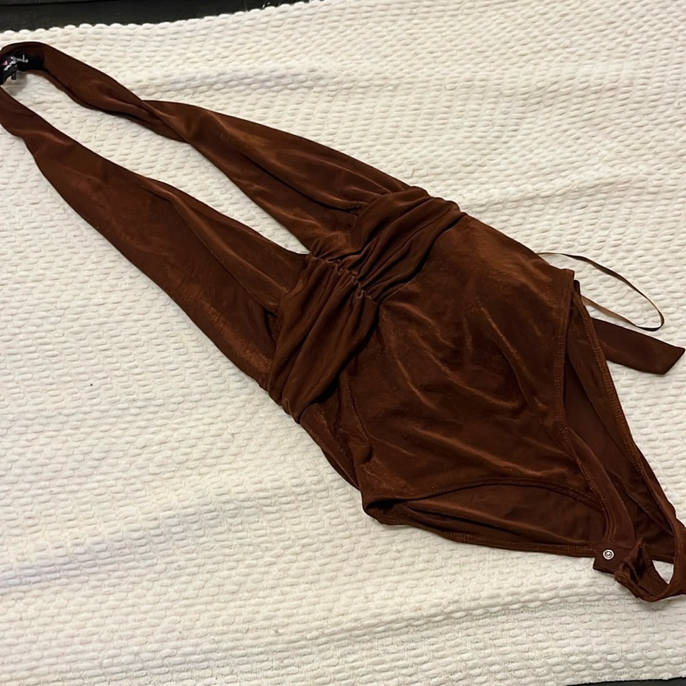 Brown body suit